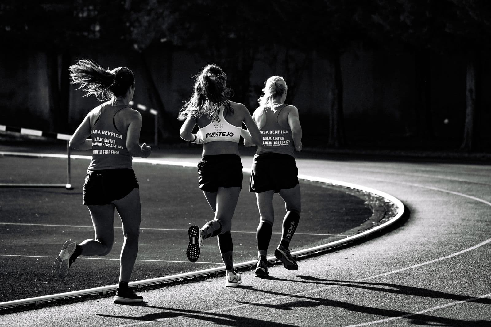 Runners training together on an athletics track